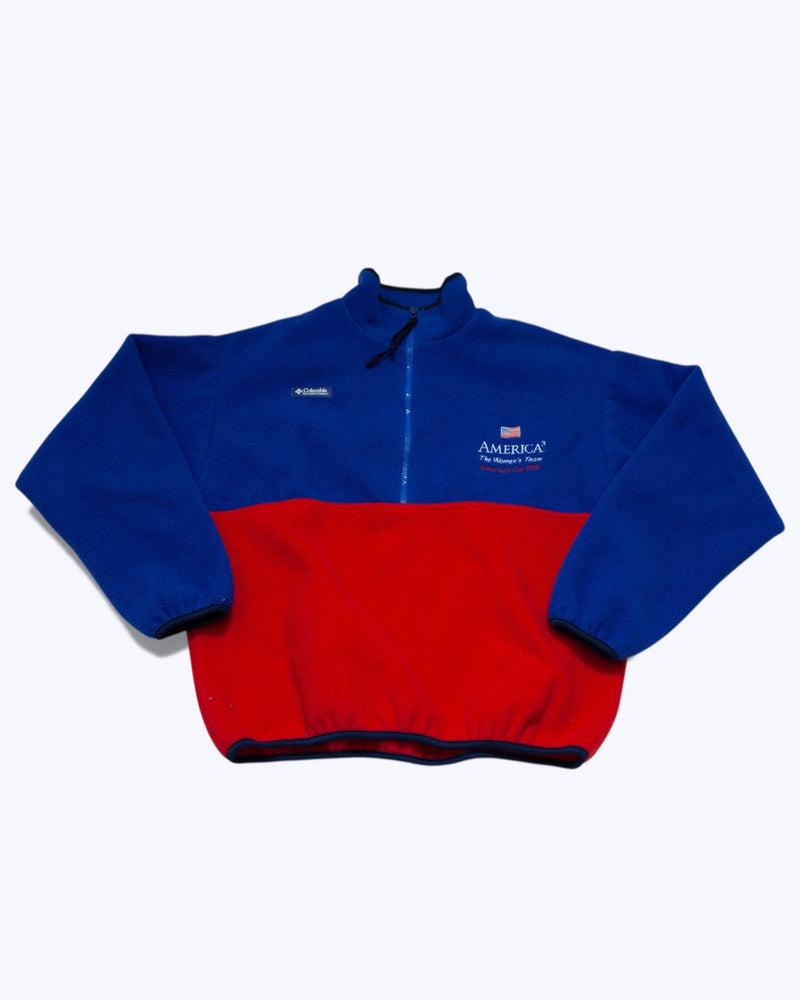 Blue and red fleece jacket with a brand logo on a white background
