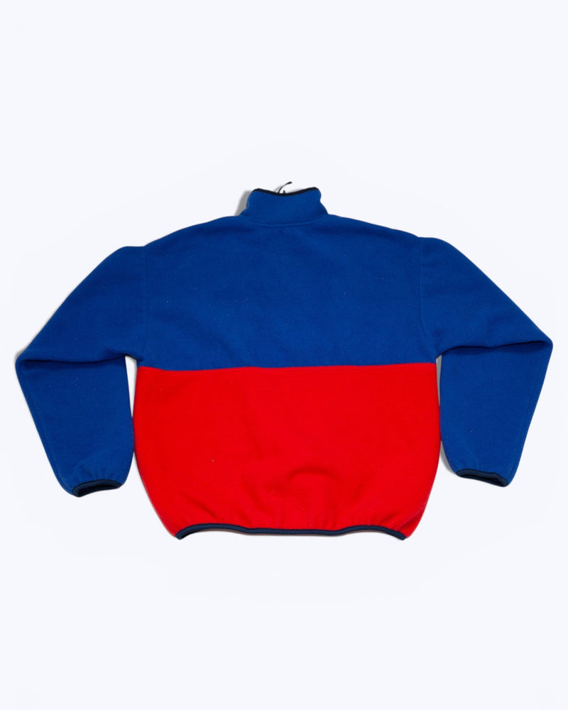 Blue and red pullover on a white background