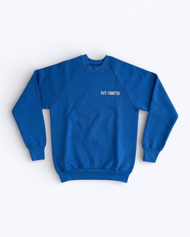 Blue sweatshirt with text on a white background