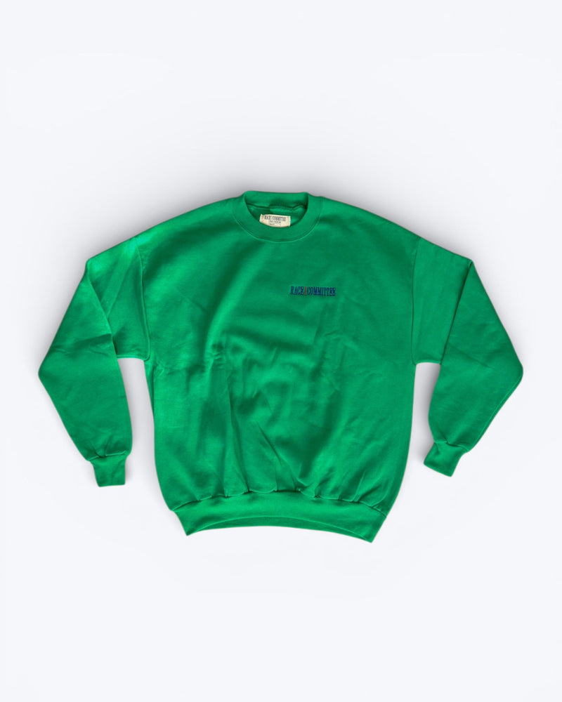 Green sweatshirt with text on a white background