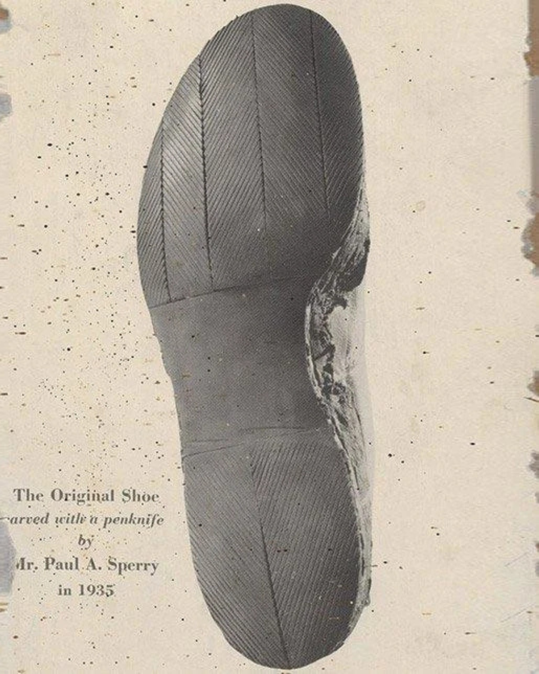 Vintage shoe sole with text on a textured background